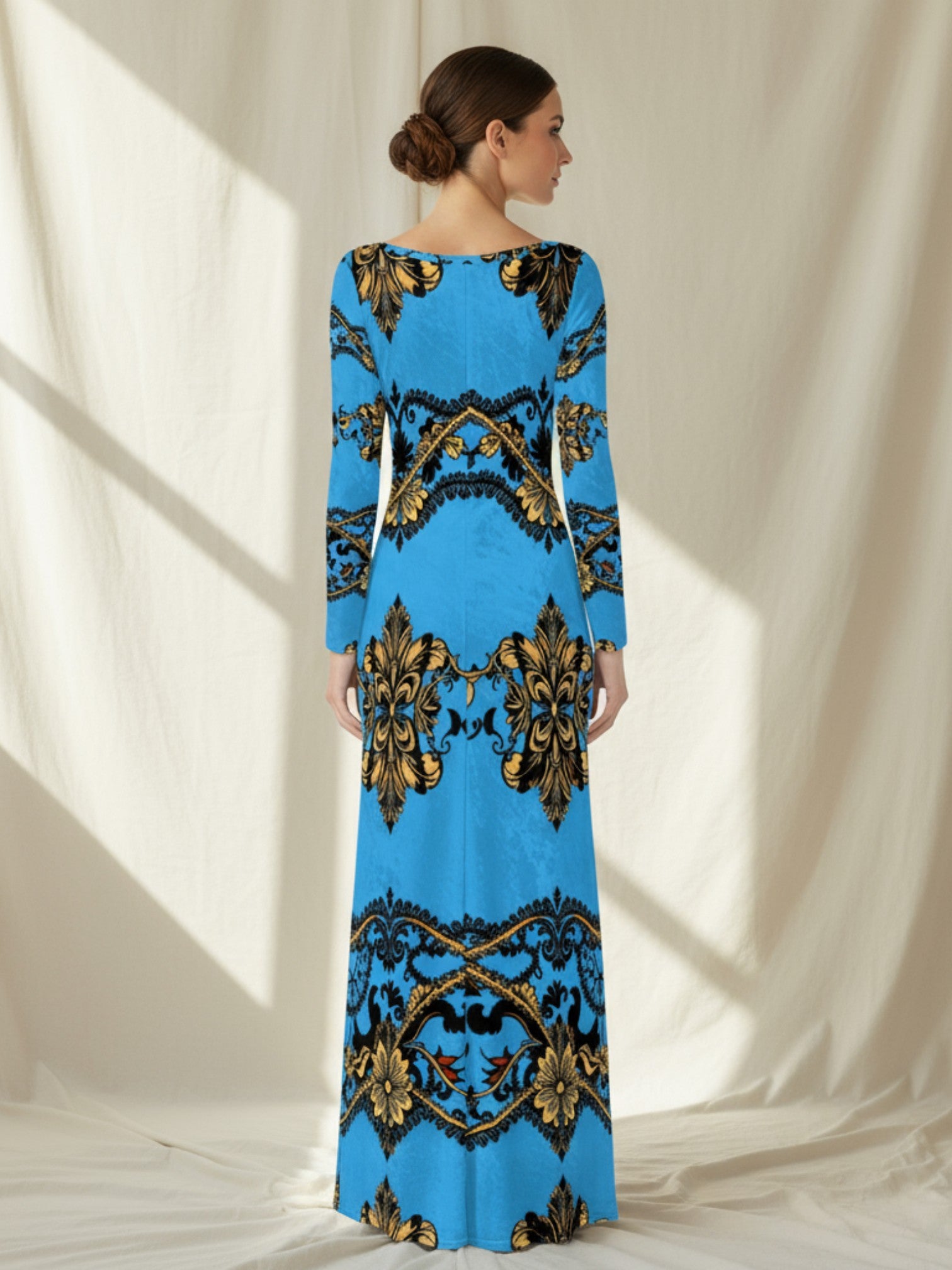 Back view of a baroque print velvet maxi dress in blue and gold from Angelic Blessings Shop