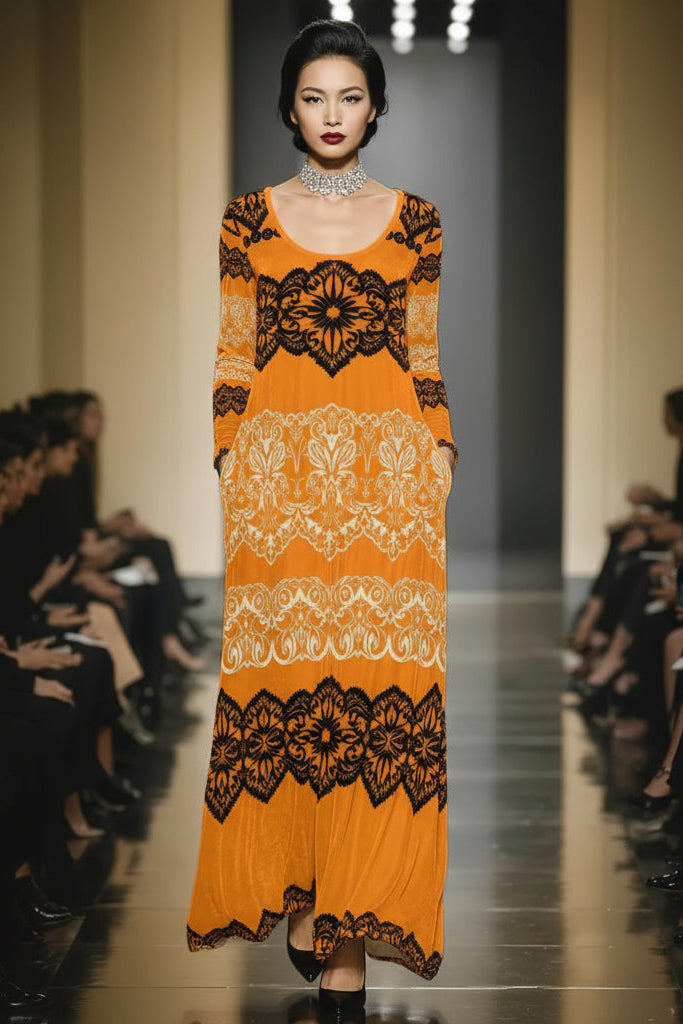 Angelic Blessings Shop luxury gold velvet evening gown with intricate black and beige patterns on runway