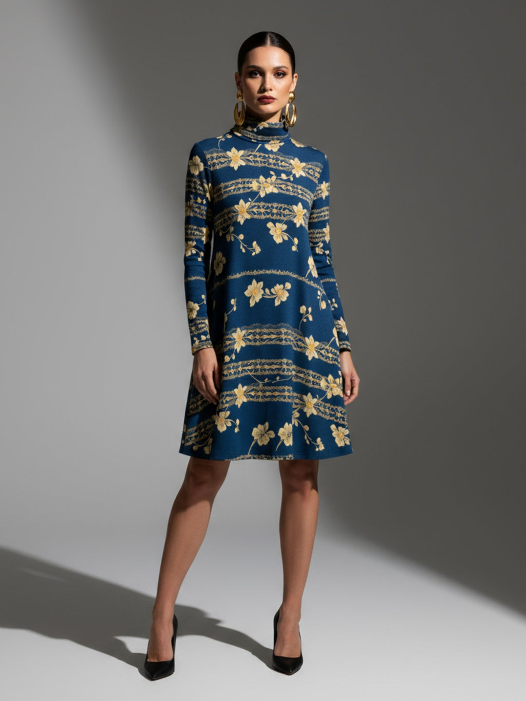 Navy blue floral high neck dress with long sleeves from Angelic Blessings Shop worn by model