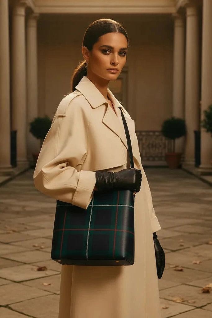 Angelic Blessings Shop old money style crossbody purse in black with green plaid pattern worn with beige trench coat