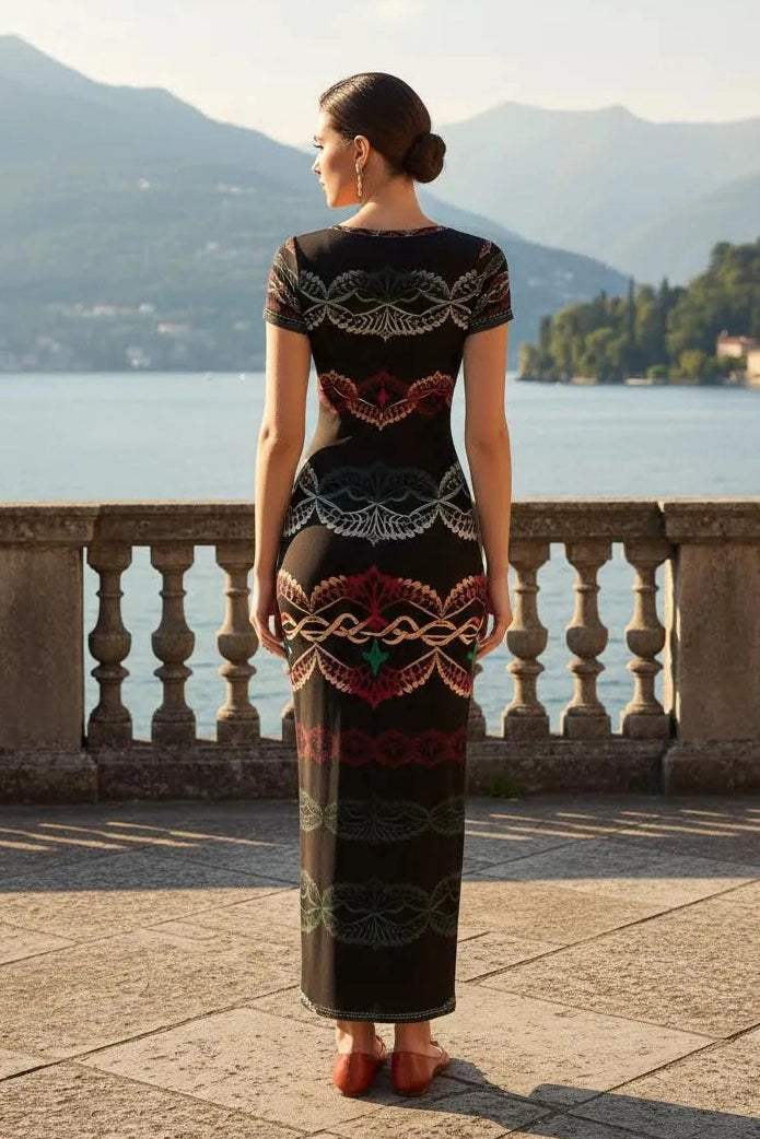 Back view of elegant short sleeve midi dress with intricate patterns worn by woman outdoors